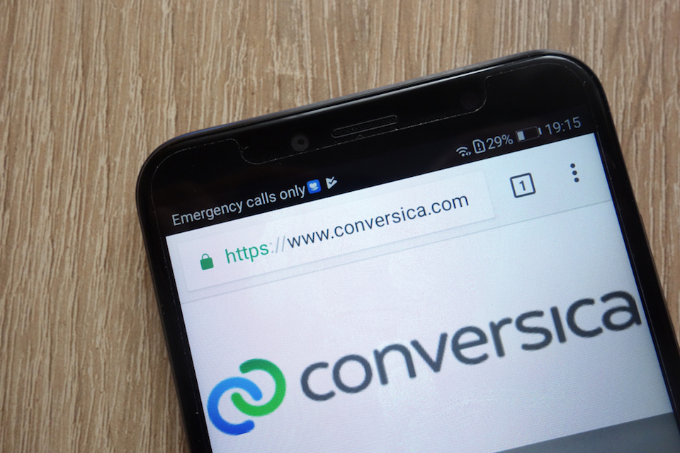 Conversica logo pictured on a phone