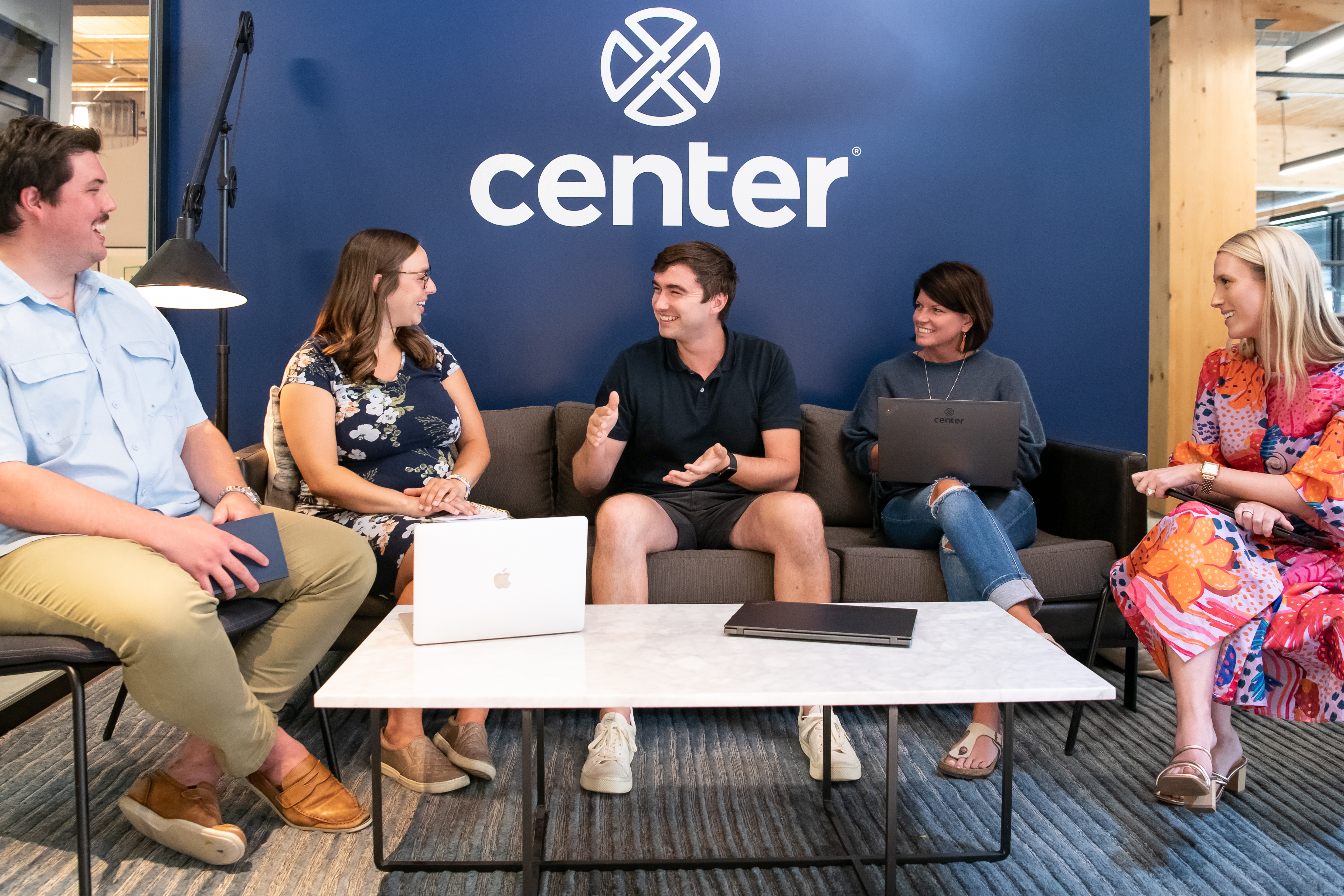 Members of the Center team meeting in an office lounge