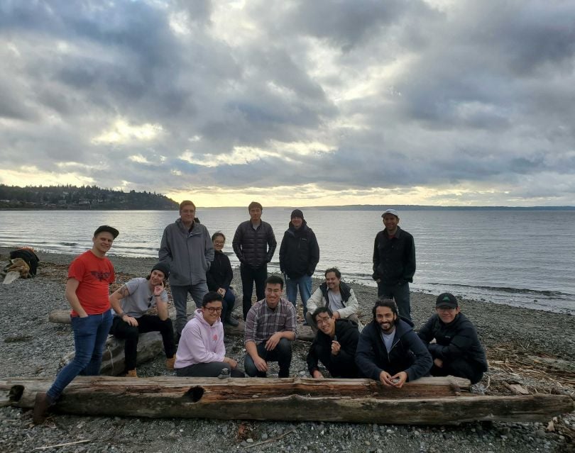 Qualtrics coworkers at a lake