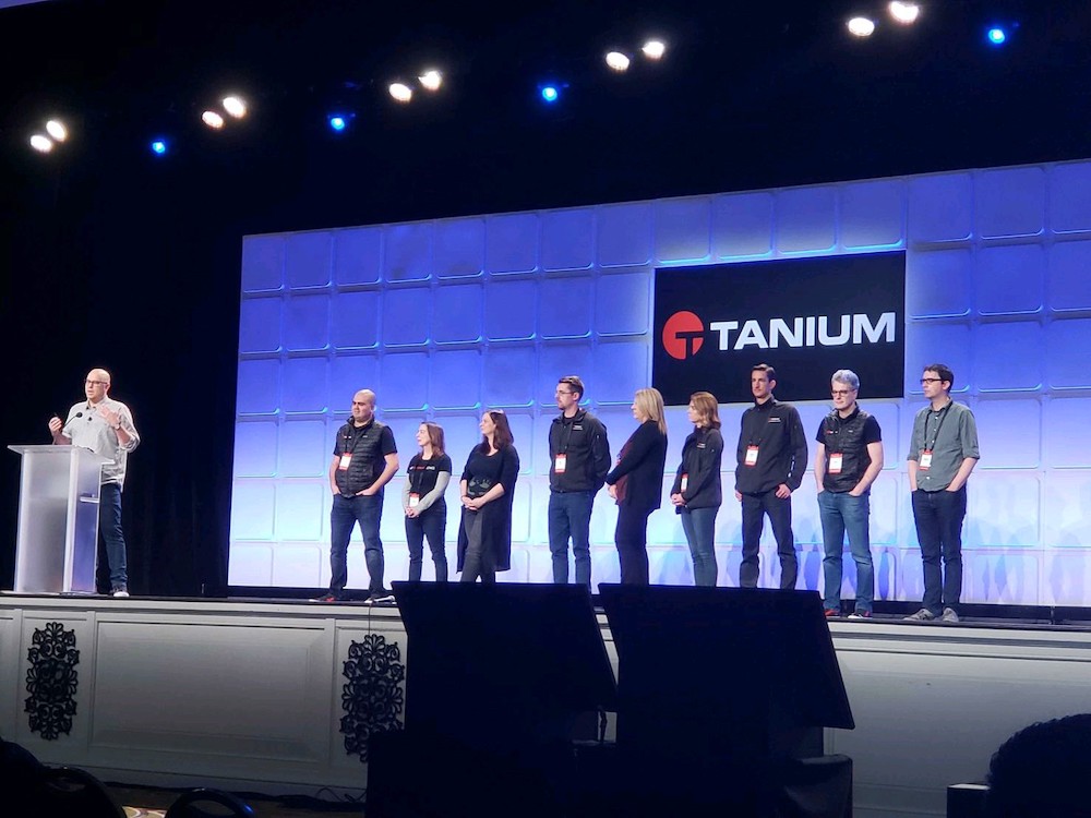 Tanium team onstage at conference
